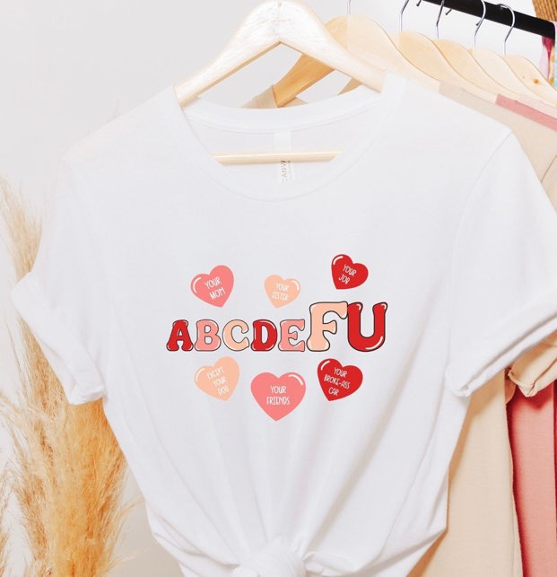 Close up of premium screen printed slogan text and graphic hearts