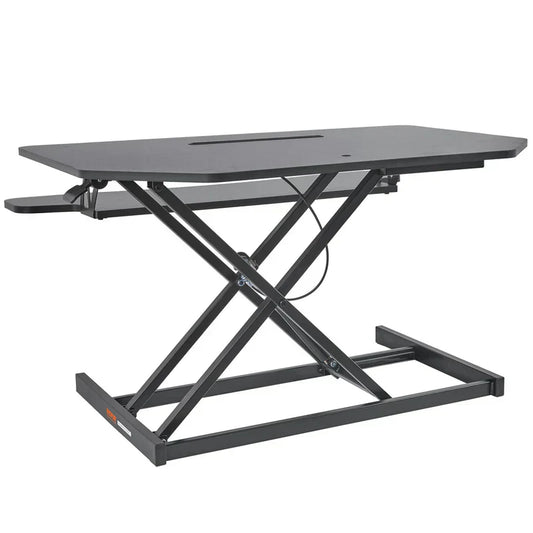 Adjustable standing desk converter riser designed for a sit stand home office setup.