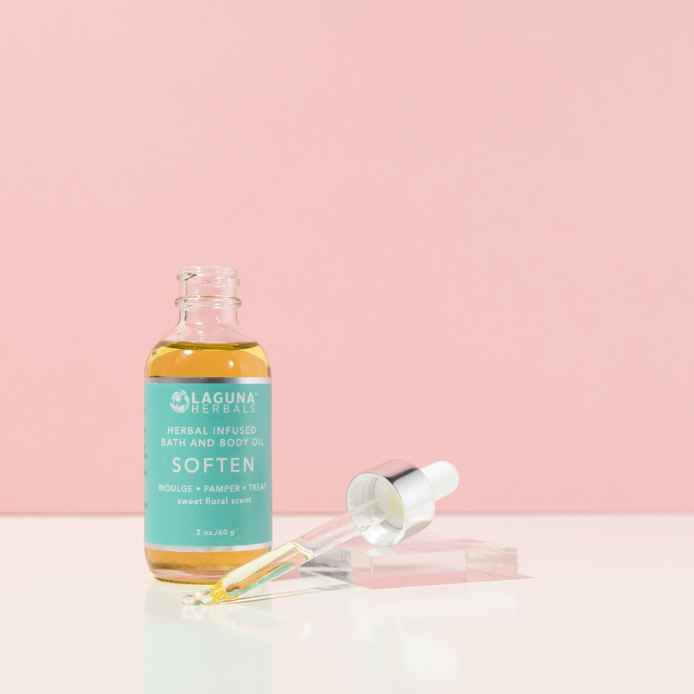 luxurious natural body oil bottle infused with organic jasmine and rose petals