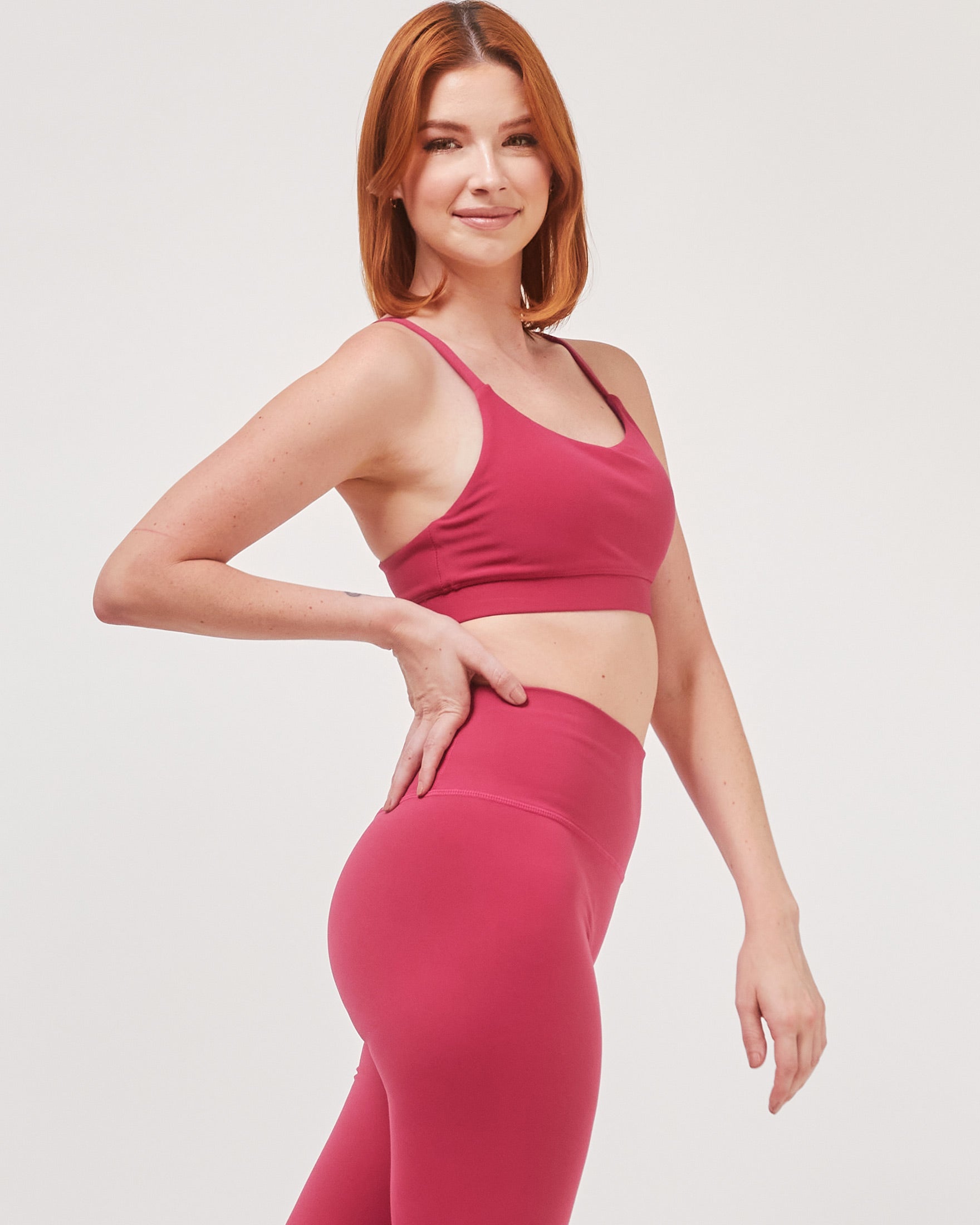 breathable athletic compression sports bra showing cross back strap detail