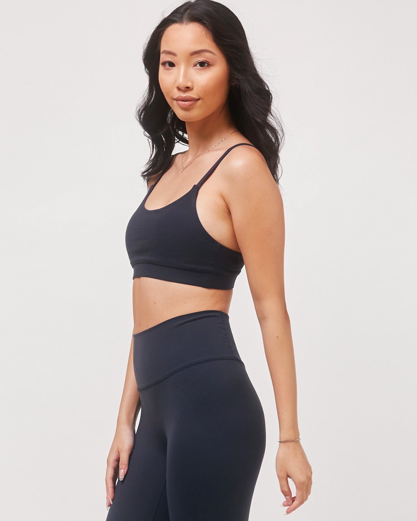 minimalist supportive gym apparel sports bra close up profile space navy
