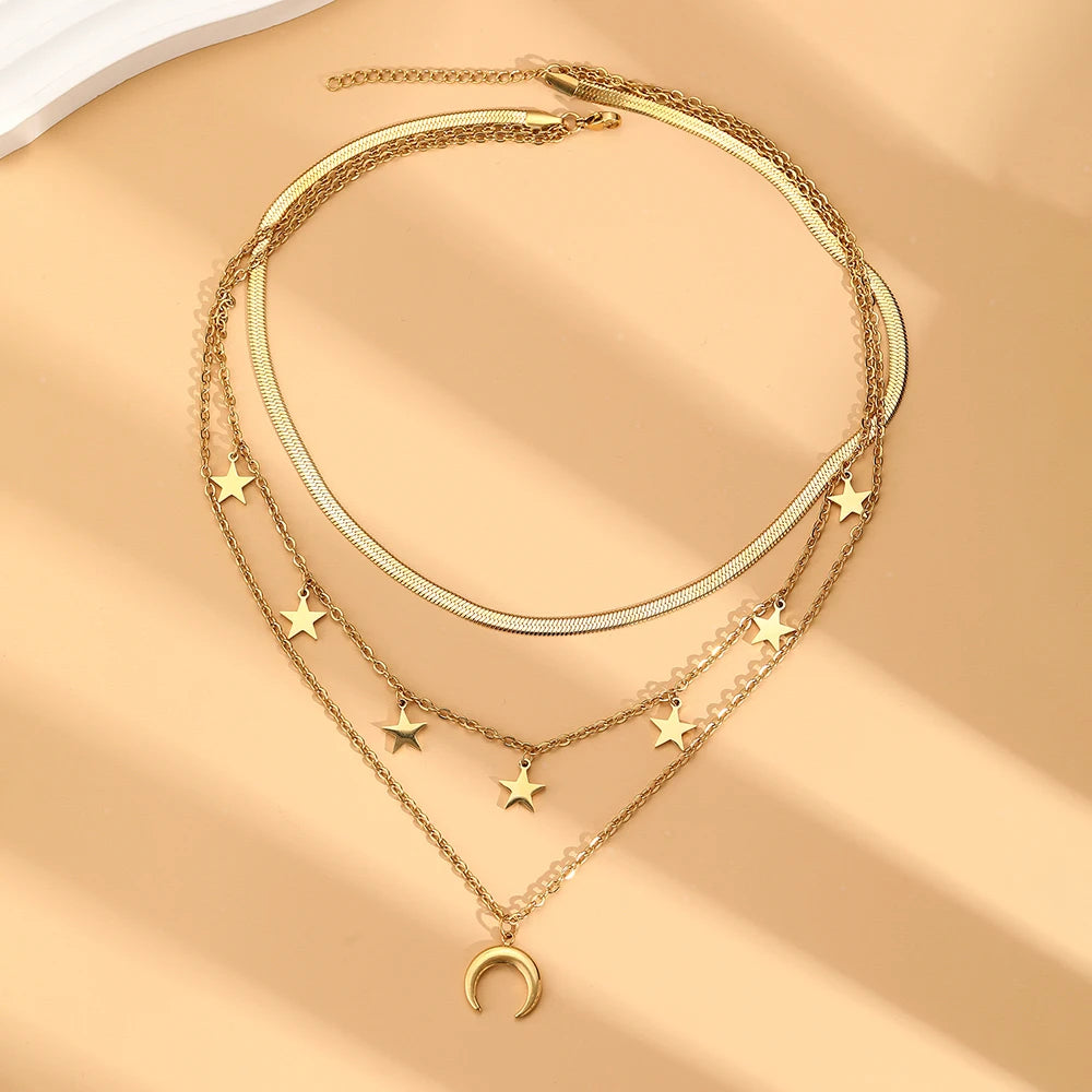 tarnish free gold tone steel layered necklace layout separate studio presentation