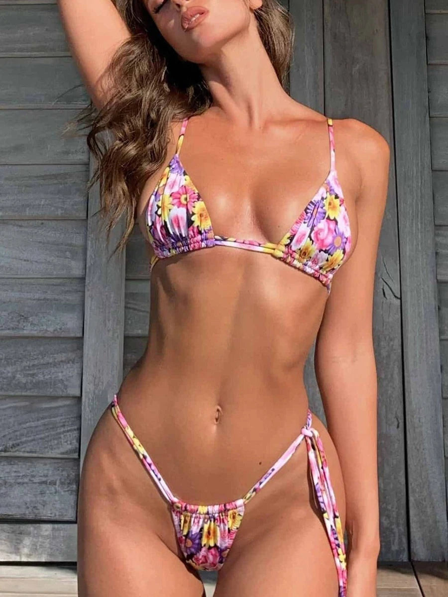 Premium two piece swimsuit featuring a molded push up bikini top and cheeky Brazilian bottoms.