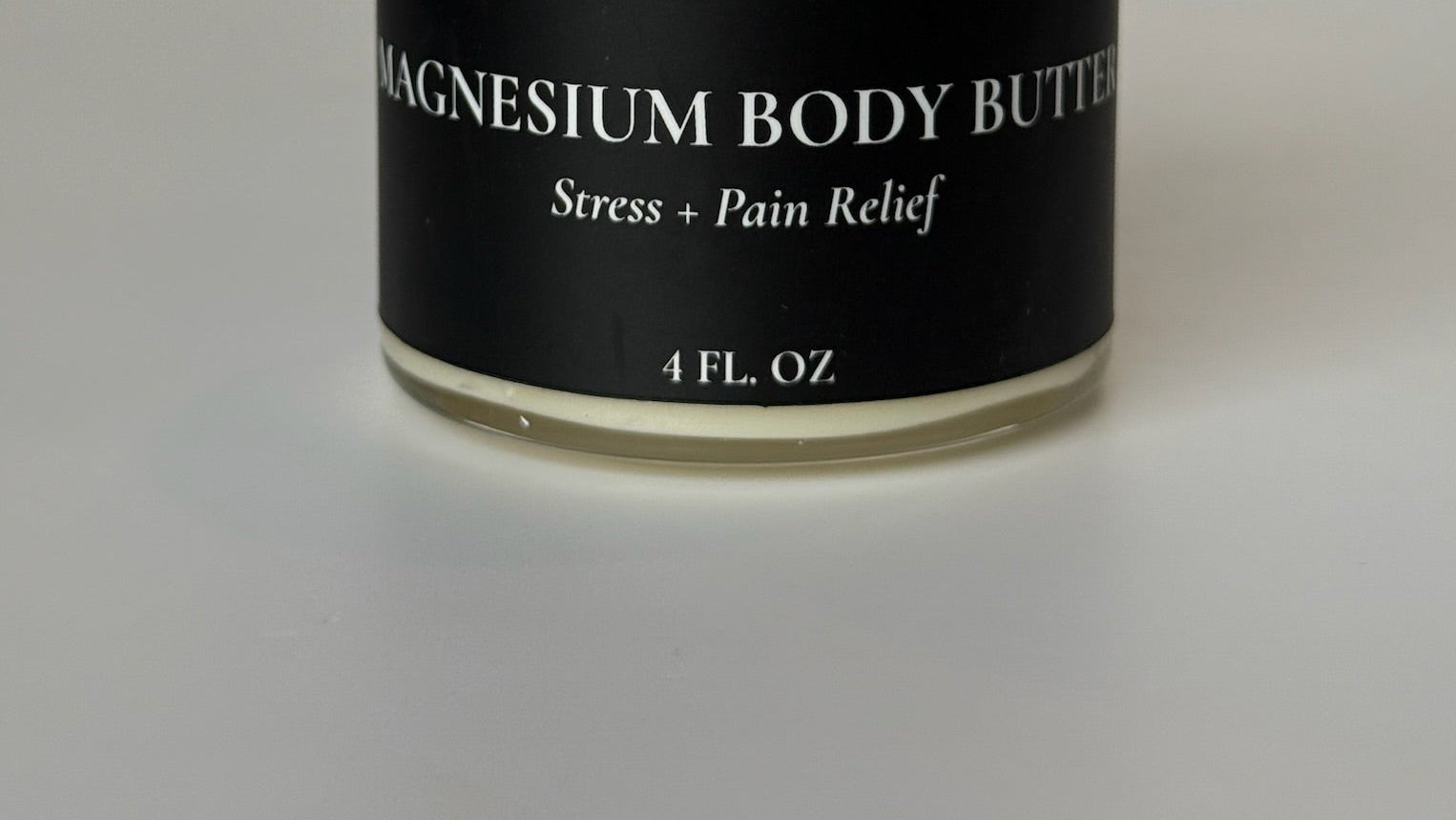 rich nourishing magnesium body butter cream jar for muscle relaxation 8oz
