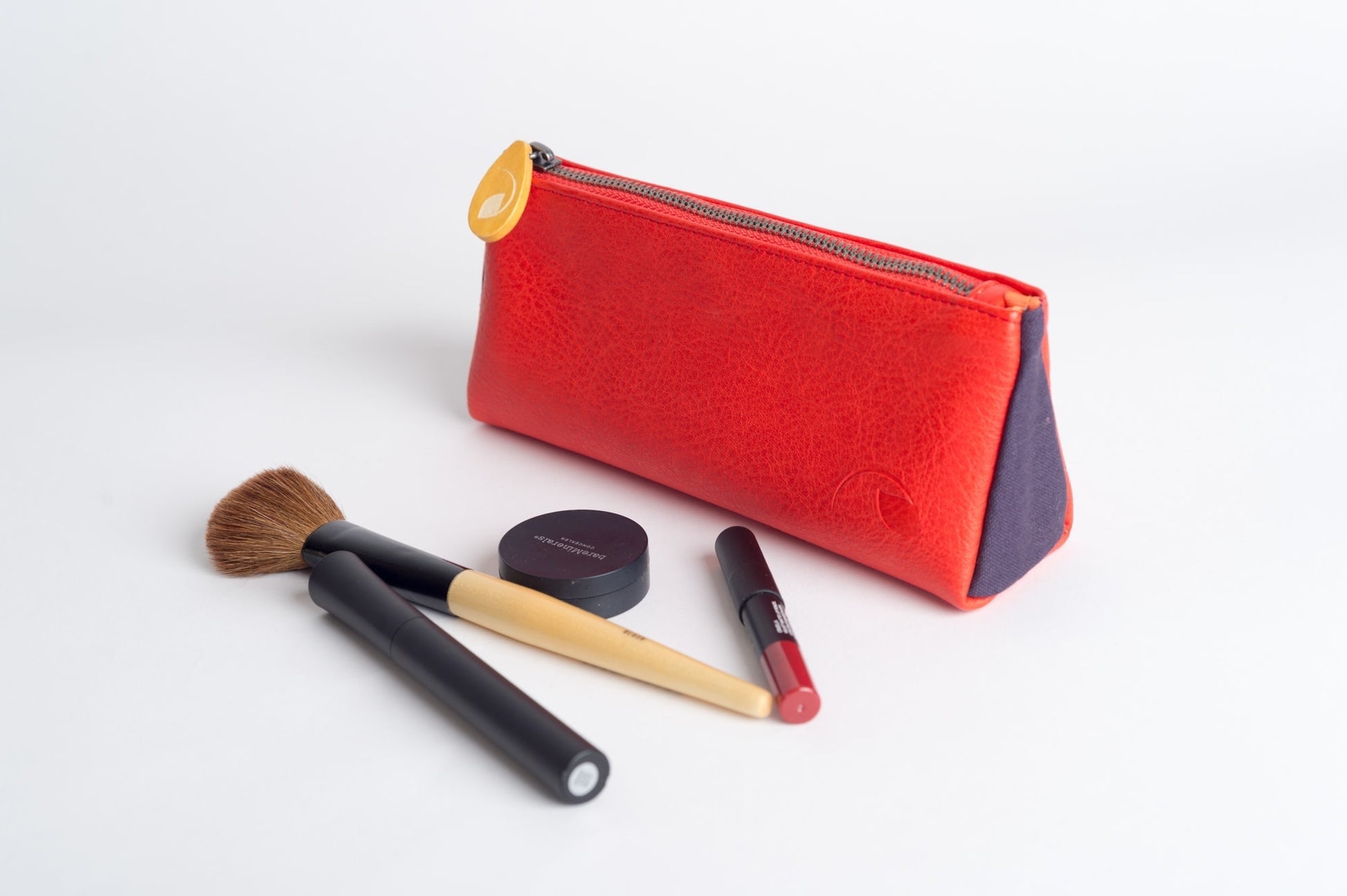 compact zipper pouch bag for luxury cosmetics and brush protection view