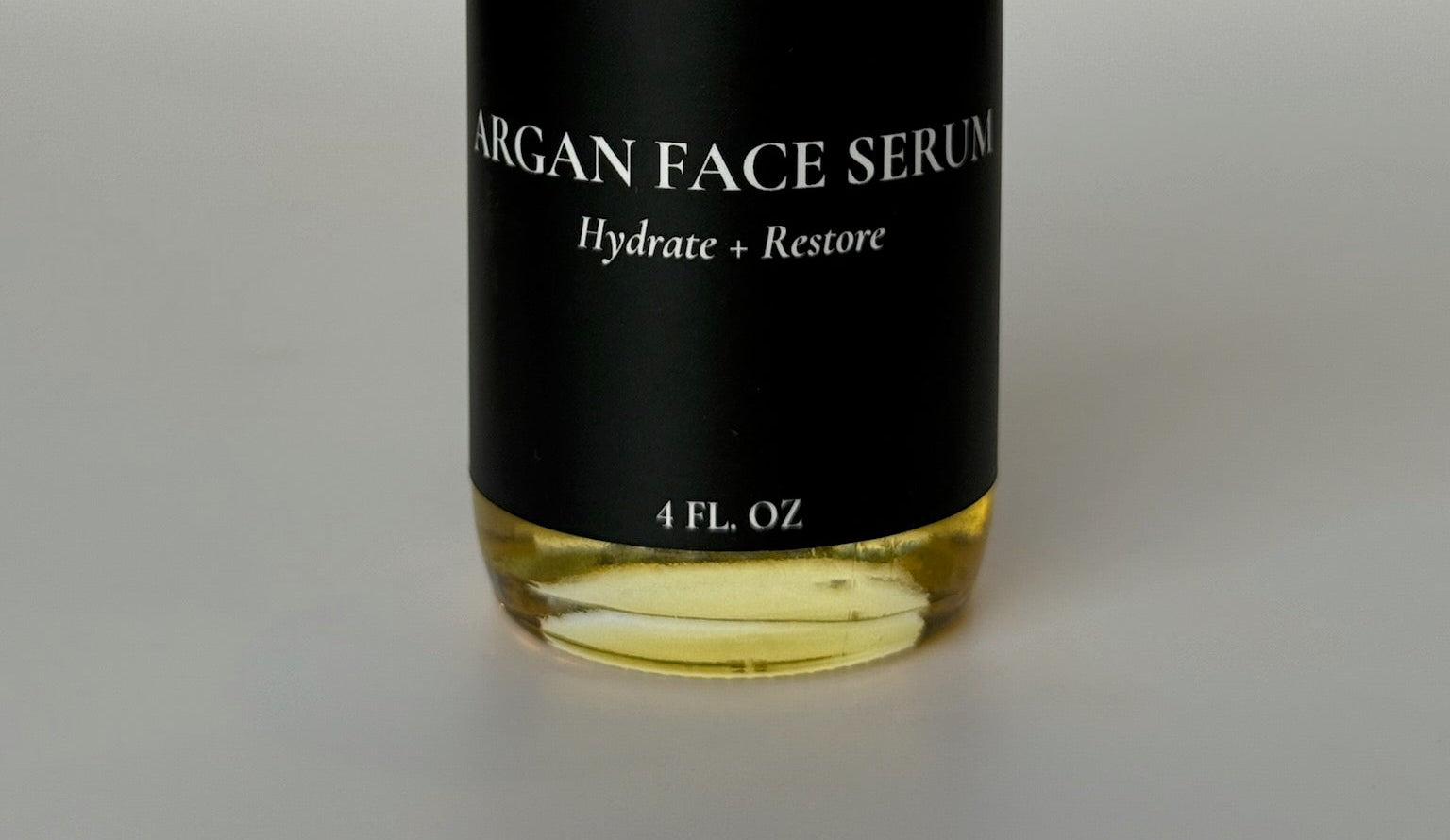rejuvenating natural argan face serum glass dropper bottle for skincare 4oz